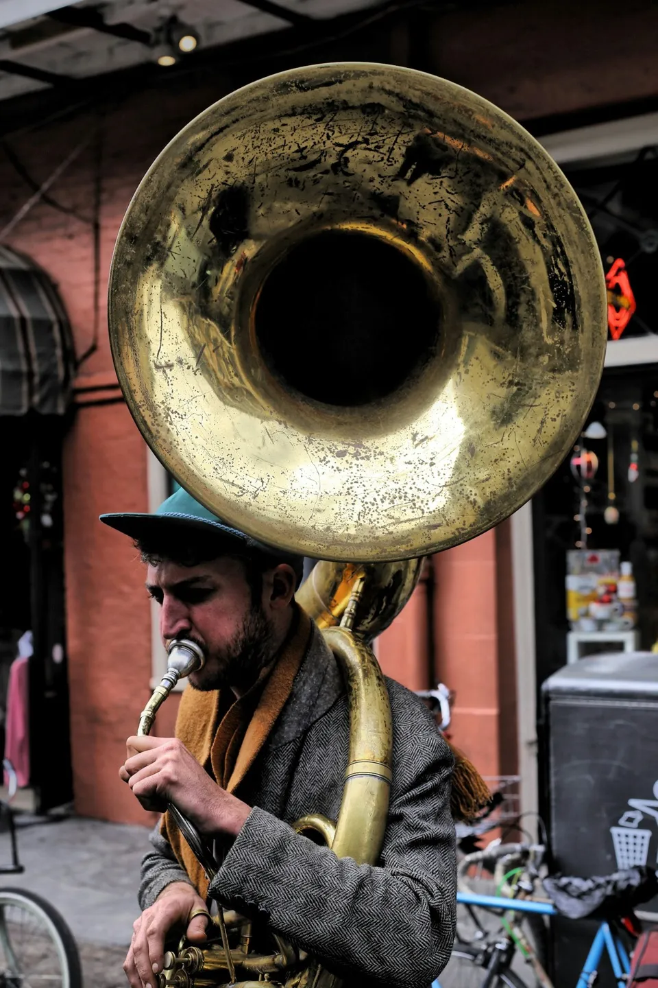 A street musician playing a brass sousaphone in New Orleans.